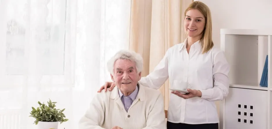 Old man with his caregiver